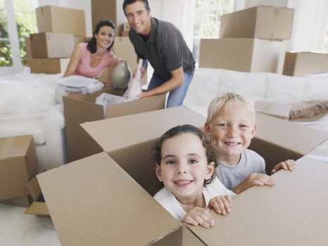 Movers preparing a Sands End residential move with boxes and furniture