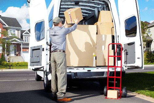 Packed boxes and furniture ready for a local home relocation