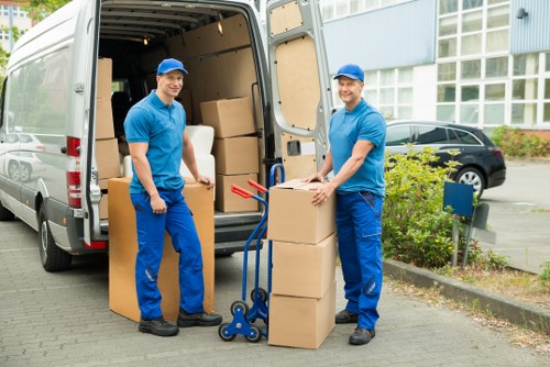 Local movers handling furniture and boxes in Sands End