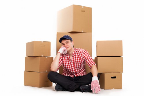 Furniture being carefully moved from a Sands End apartment building